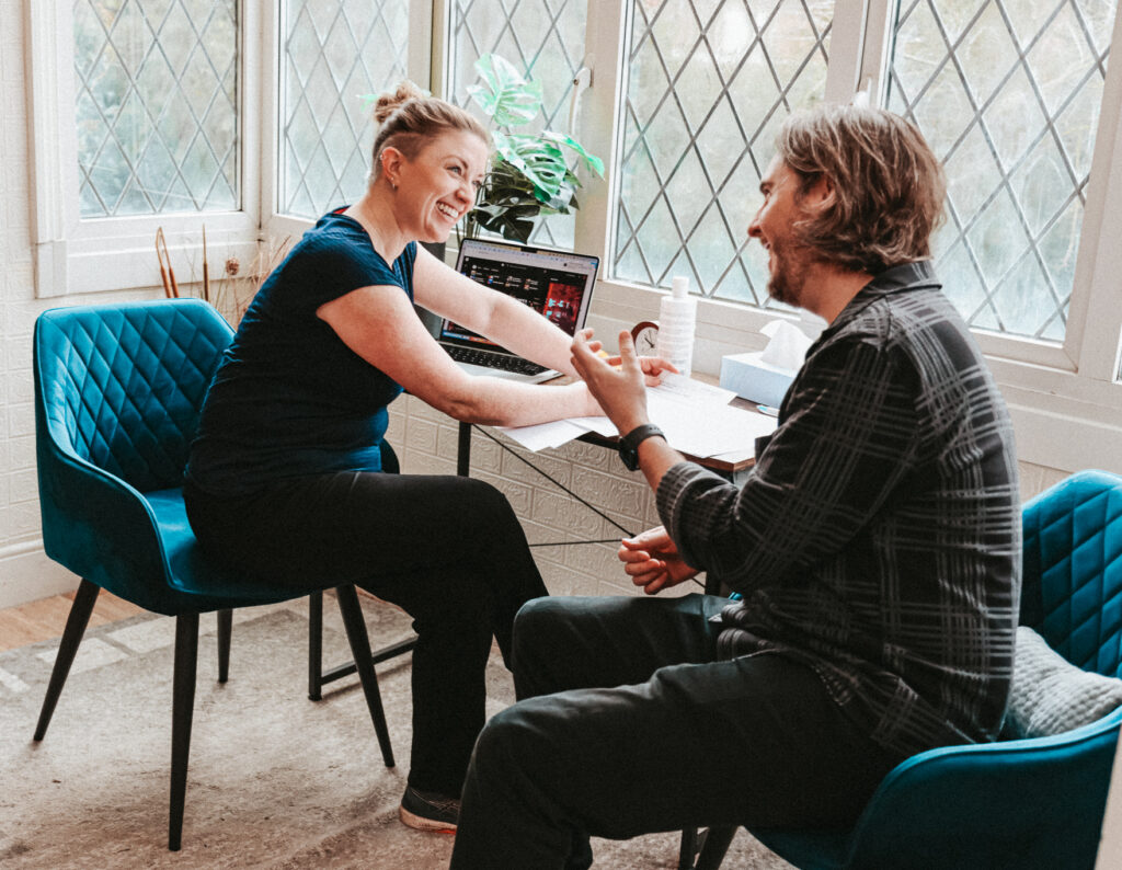 Gemma in her clinic meeting with a client